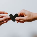 Minefield of Relationship Warning Signs ,hands and heart, love